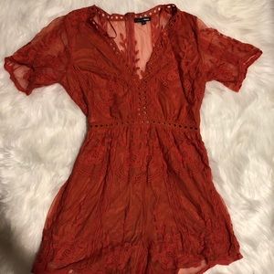 Orange/red lace romper